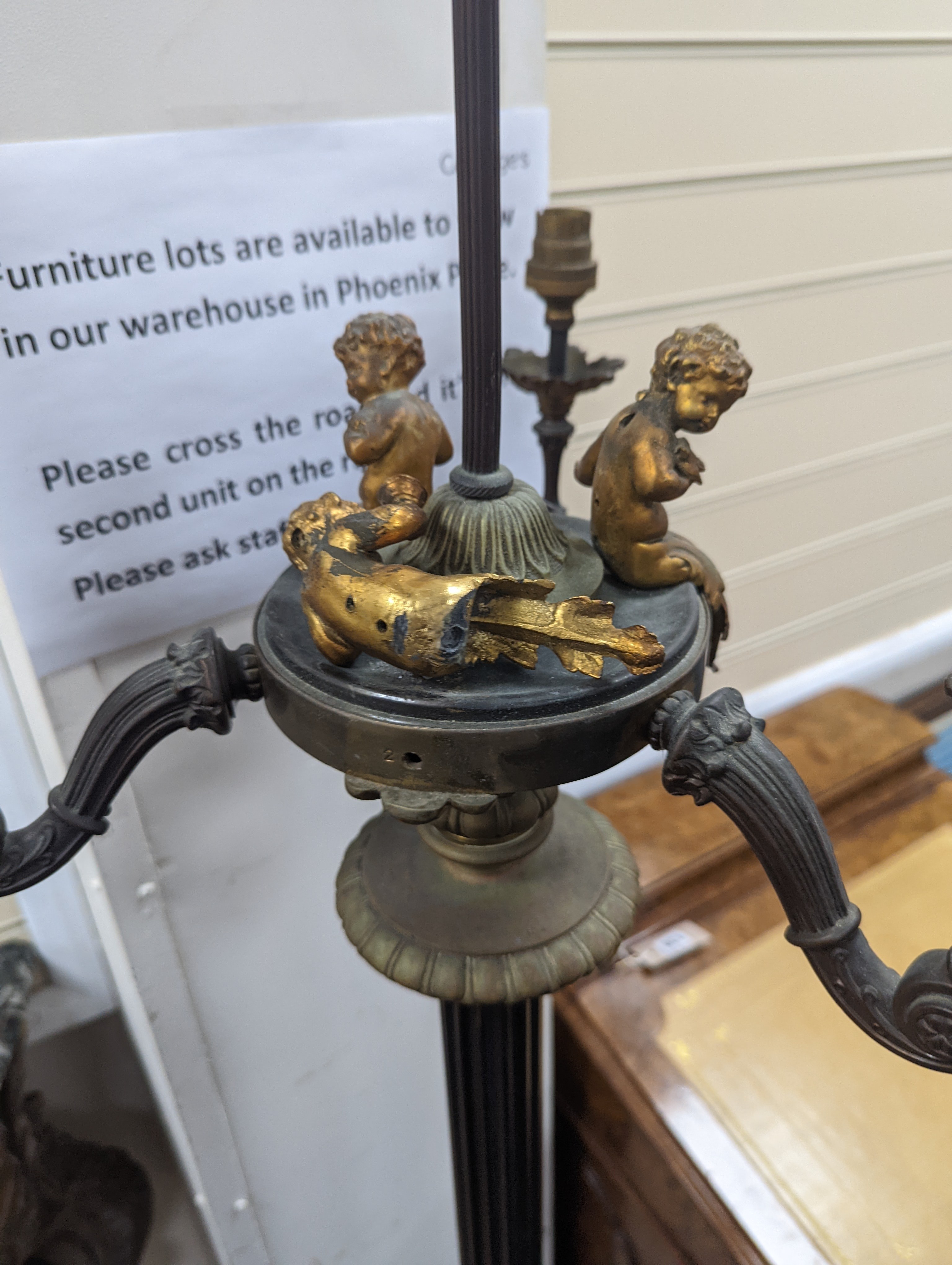 An Empire style gilt metal four branch light floor lamp, height 160cm